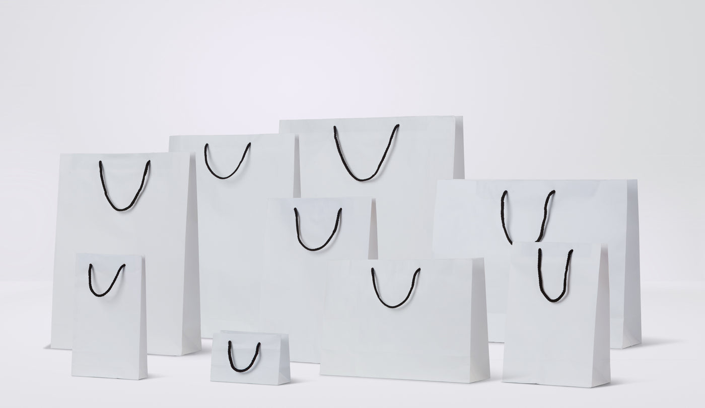 White Deluxe Kraft Carry Bags